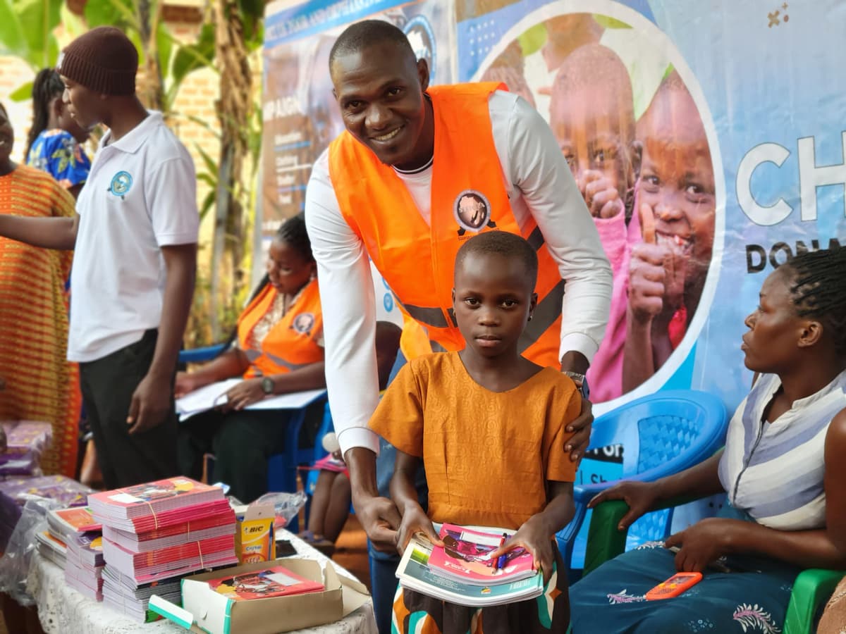 SSOPORA UGANDA INITIATIVE team working with community